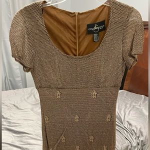 Golden bronze color • long lined gown • exquisite silhouette • sophisticated